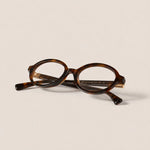 ÓCULOS MIU MIU OVAL GRAU